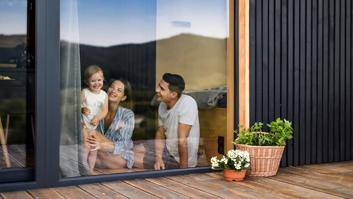 family looking out window